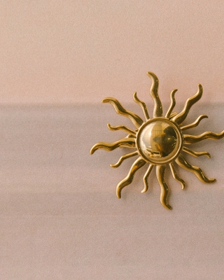 Golden Sunburst Brooch