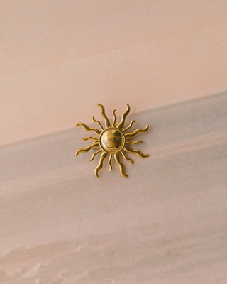 Golden Sunburst Brooch