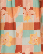 Fabric with a checkered pattern and floral designs in orange, pink, and green.