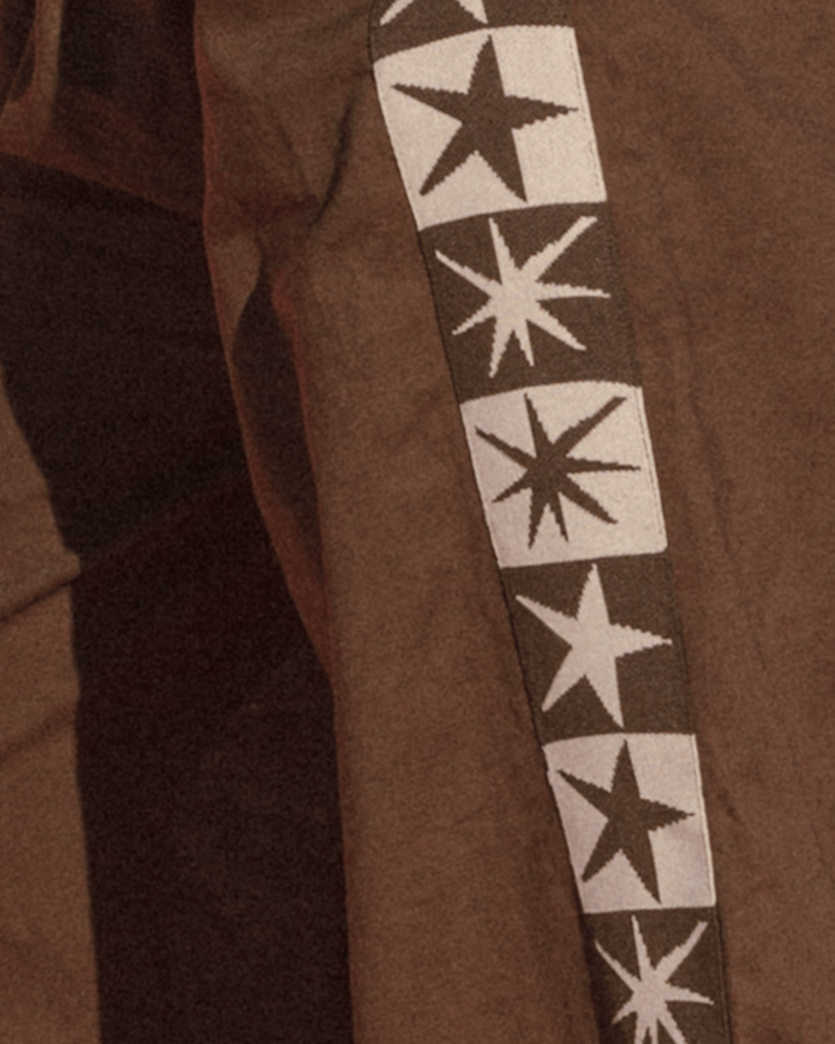 Brown fabric with star patterned band